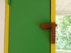 Floor-to-ceiling wood panels can be open to let air in